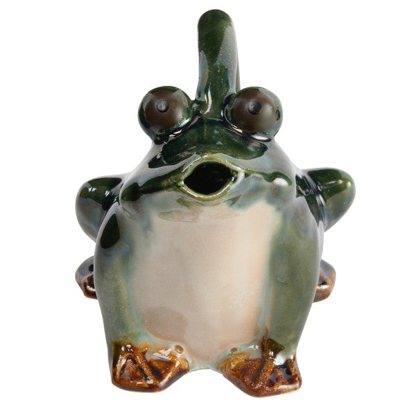 A green stoneware watering pitcher designed to resemble a frog.